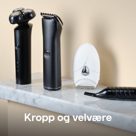 Copy: Kropp og velvære
    Bild: En oppstilling av produkter for personlig pleie, som barbermaskiner og helseprodukter, presentert på en marmorflate i et stilrent miljø.

