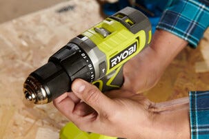 Ryobi skruvdragare med slag RPD18-2C20SA127, 2 batterier