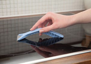 Sini hällsskrapa för glasytor