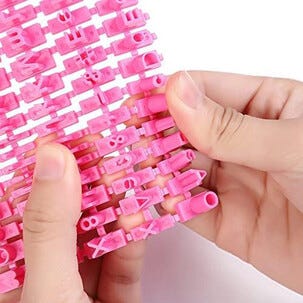 Bokstavpresse for leire