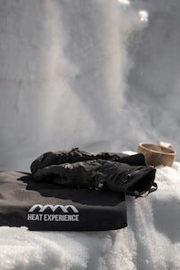 Lämmittävä istuinalusta, ladattava, HeatX