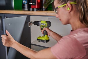 Ryobi skruvdragare med slag RPD18-2C20SA127, 2 batterier