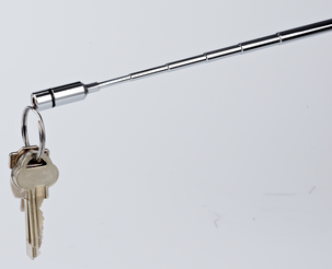 Magneetti, jossa on teleskooppivarsi ja LED-lamppu