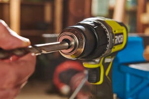 Ryobi skruvdragare med slag RPD18-2C20SA127, 2 batterier