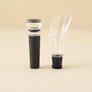 Setti, jossa viininkaadin ja vakuumikorkki