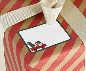 Juletiketter på rulle julmotiv med tomte, 50-pack