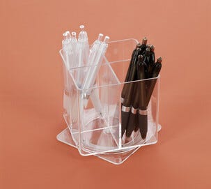 Roterende penneholder med 4 rom i klar plast 11,5x12 cm