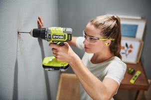 Ryobi skruvdragare med slag, 2 batterier RPD18-2C42S