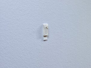 Självhäftande krokar Tesa