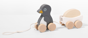 Draleke i tre, pingvin med vogn