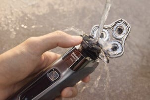 Philips X9002/10 rakapparat med SkinIQ-teknik