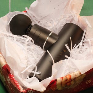 Capere massagepistol mini med 4 massagehuvuden